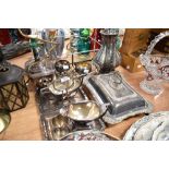 A selection of silver plated table wares including tea pots