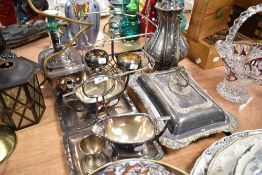 A selection of silver plated table wares including tea pots