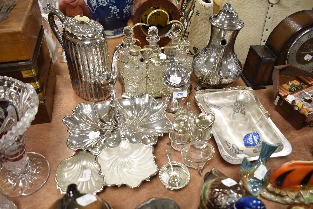 A selection of fine plated table wares including cruet sets and condiments