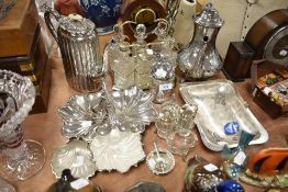 A selection of fine plated table wares including cruet sets and condiments