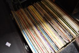 A mixed selection of vinyl albums including Buddy Holly, Decca and The Beatles Mono