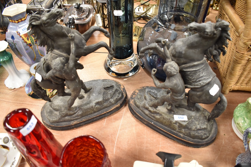 A pair of mid Victorian French spelter mirrored marley horse figures