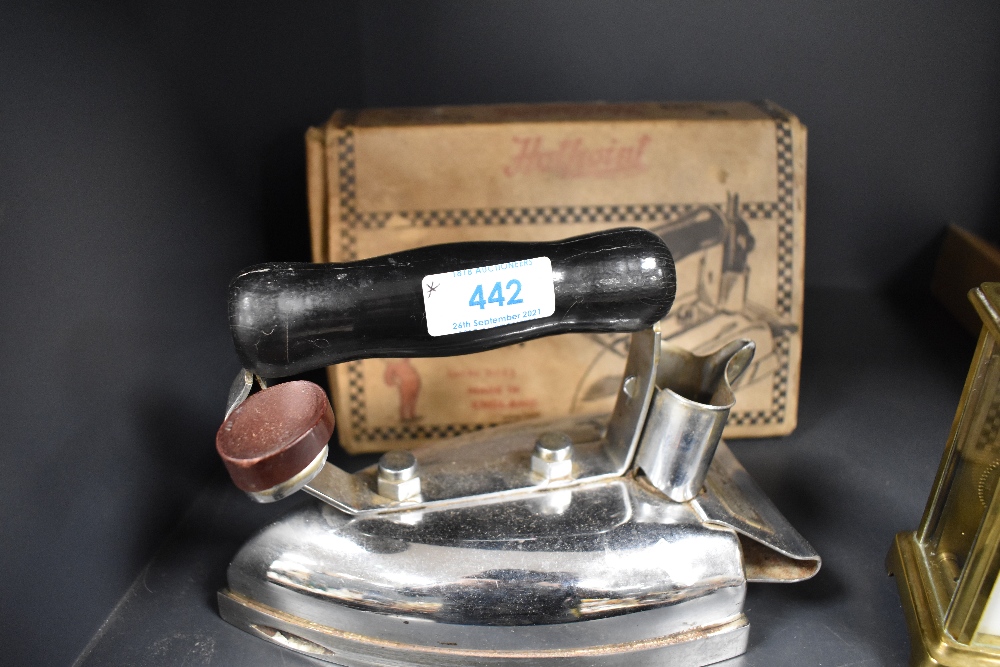 A vintage De Luxe electric iron in box
