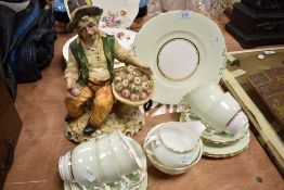 A part tea service by Colclough in a green and gilt colour way