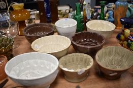 A selection of antique and later ceramic jelly and cake molds