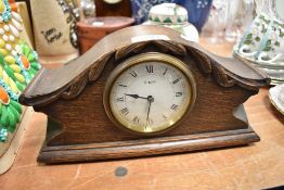 An Edwardian mantle clock having oak case and French made movment