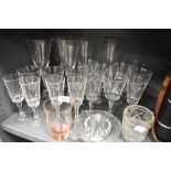 A selection of glass wares including pink etched vase and wine glasses including Crystalite Bohemia