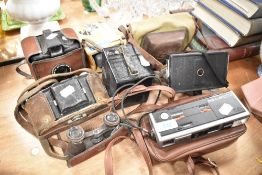 Six vintage cameras including Minolta, Coronet and Wembley Sports