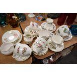 A selection of tea cups and saucers including Heathcote, Elizabethen and Colclough