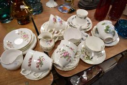 A selection of tea cups and saucers including Heathcote, Elizabethen and Colclough