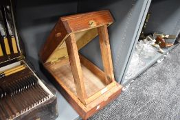 A portable hand made artist easel with inner storage