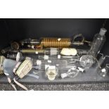 A selection of scientific glass measures and tubes for chemistry or experiments
