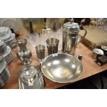 A fine selection of German pewter including Gegossen, twin handle footed bowl and large beer stein