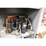 Two pairs of binoculars including Bosche 10x50 and Regent 10x50 both with case