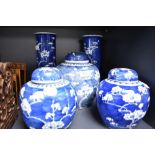 A selection of Chinese export porcelain including two tall stem vases, a large ginger jar and two