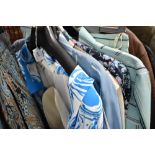 A mixed lot of ladies retro clothing including skirt sets and dresses.