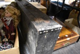 A vintage wooden tool chest and a selection of tools.