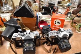 A selection of cameras and accessories including Zenit and Brownie Junior