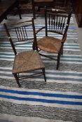 Two 19th Century Childs rush seated spindle back chairs