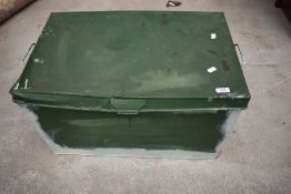 A vintage metal tin trunk or bedding box