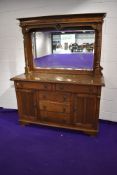 A mirror backed sideboard in oak early 20th century 150cm long