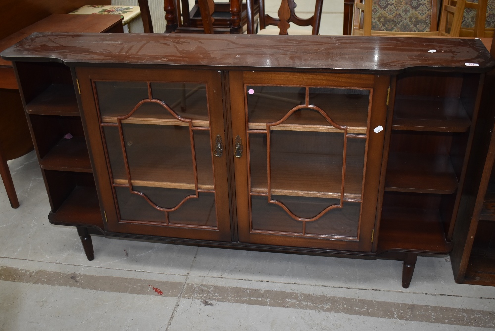 A reproduction mahogany low bookcase/display cabinet, width approx. 153cm