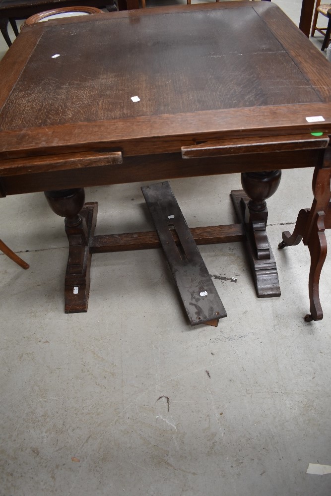 An early 20th Century oak drawer leaf table, approx. 91 x 91cm closed