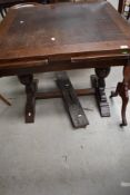 An early 20th Century oak drawer leaf table, approx. 91 x 91cm closed