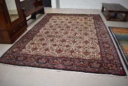 A Large Persian or Belgian carpet square/rug, approx 375 x 265cm, labels to reverse suggesting