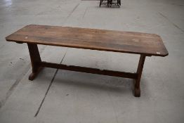 A traditional oak banquetting/supper table in the refectory style, canted corners, approx. 220 x