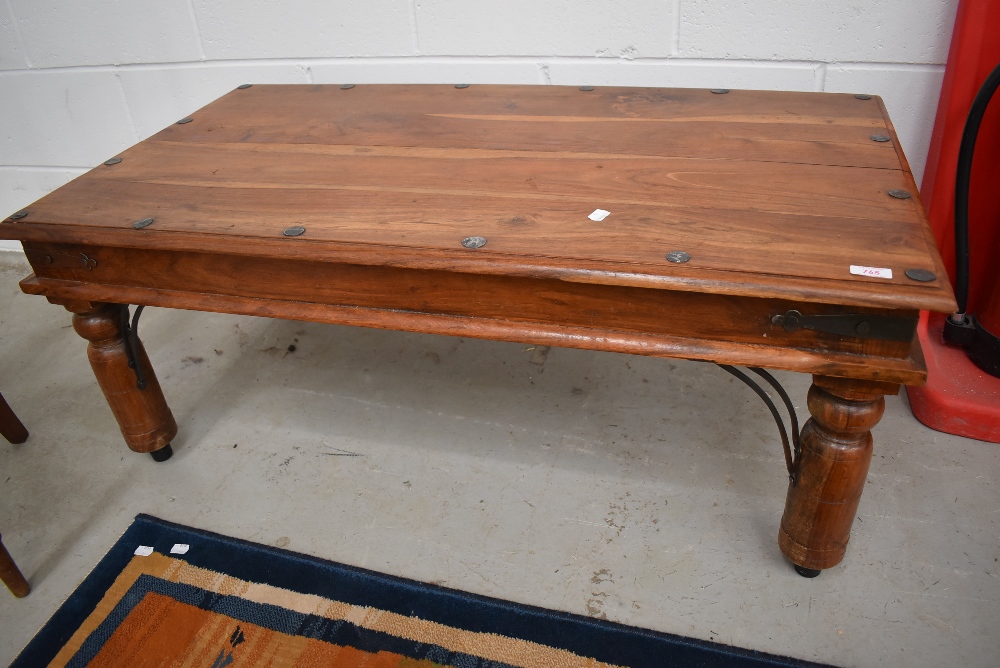 A Shesham style coffee table, approx 110 x 60cm