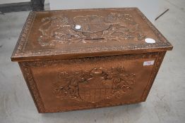A copper slipper or kindling box, heraldic decoration