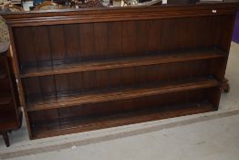 A traditional oak dresser back, width approx 187cm
