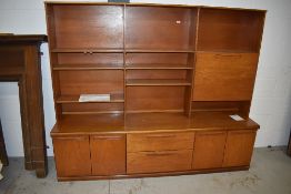 A vintage teak , G plan or similar lounge wall unit, width approx. 200cm