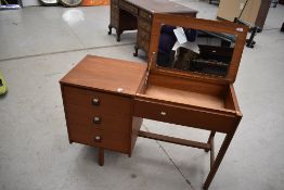 A vintage teak desk/dressing table