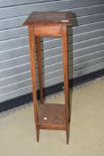 An early 20th Century oak plant stand