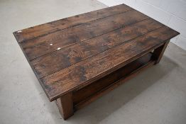 A solid oak coffee table of plank style construction with similar undertier, approx 153 x 90cm