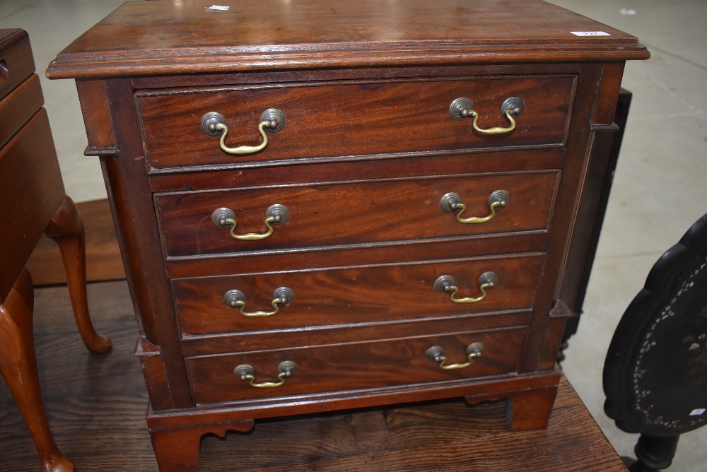 A reproduction mahogany chest of small proportions, in the Georgian style, width approx. 54cm