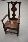 A period oak vase back carver chair