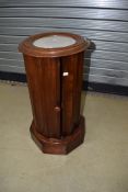 A Victorian mahogany pot cupboard having marble inset top, diameter approx. 38cm