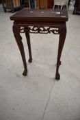 An Oriental hardwood occasional table , width approx. 51cm