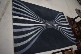 A modern teal and stripe designer rug, labelled for Next, could do with clean, approx. 280 x 200cm