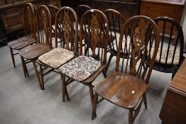 A set of of five traditional wheelback kitchen chairs