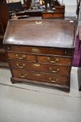 A Georgian oak bureau of nice proportions, having internal fittings and two over two drawer lower