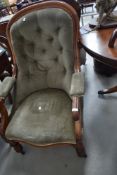 A 19th Century and later scroll armchair having button back