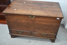 A period oak kist, lovely colour and proportions, with two base drawers, some later repair to lid,