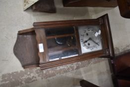 An early 20th Century oak cased wall clock, silvered dial named Wilson, Penrith