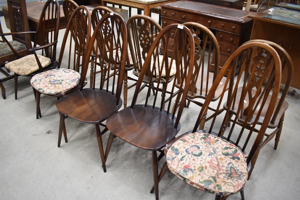 A set of five (four plus one) hoop and stick back kitchen chairs, labelled Ercol