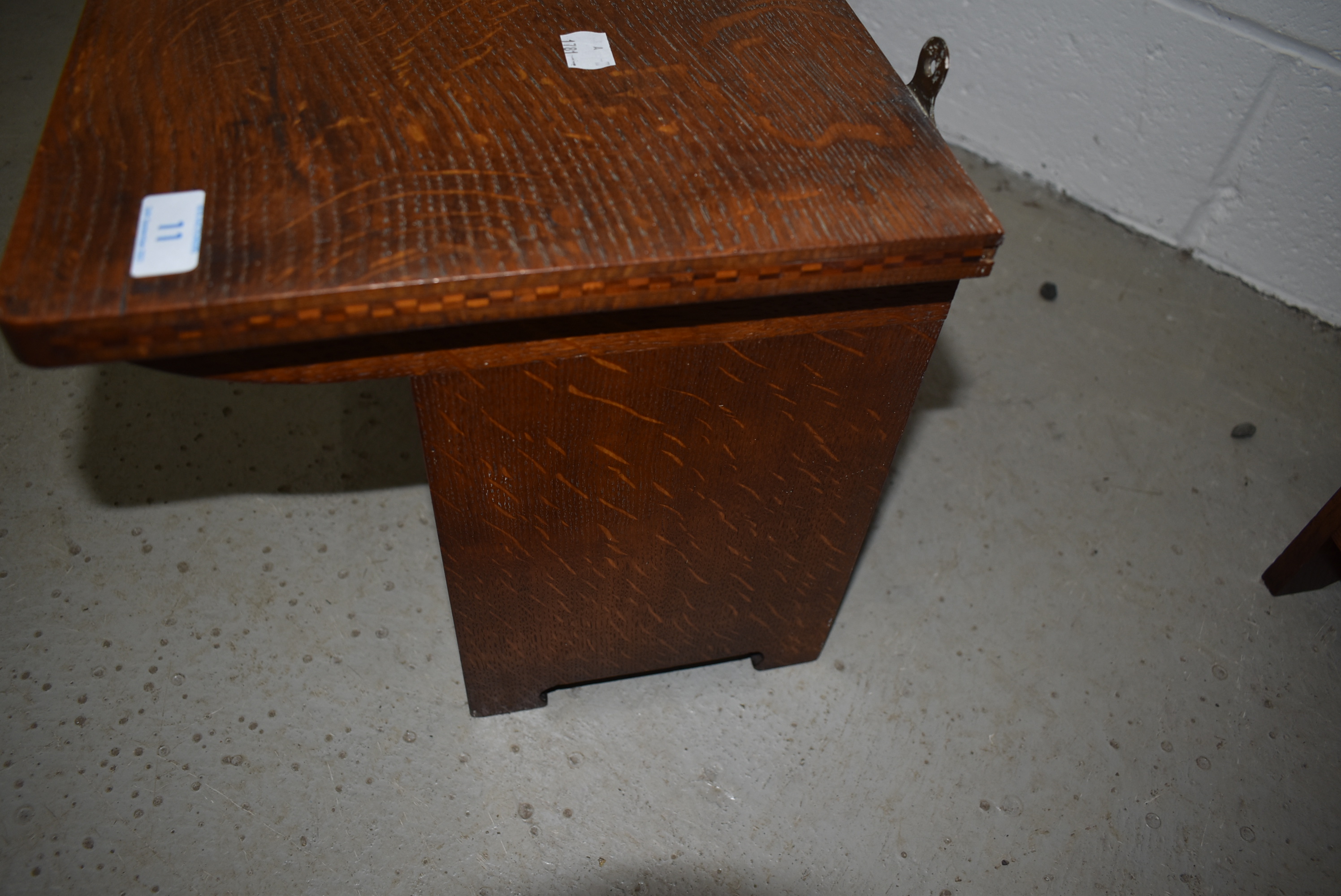 An Arts and Crafts golden oak wall shelf, labelled for Arthur Simpson Handicrafts - Image 4 of 4