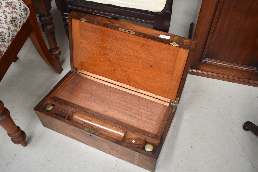 A 19th Century mahogany and brass banded lap desk